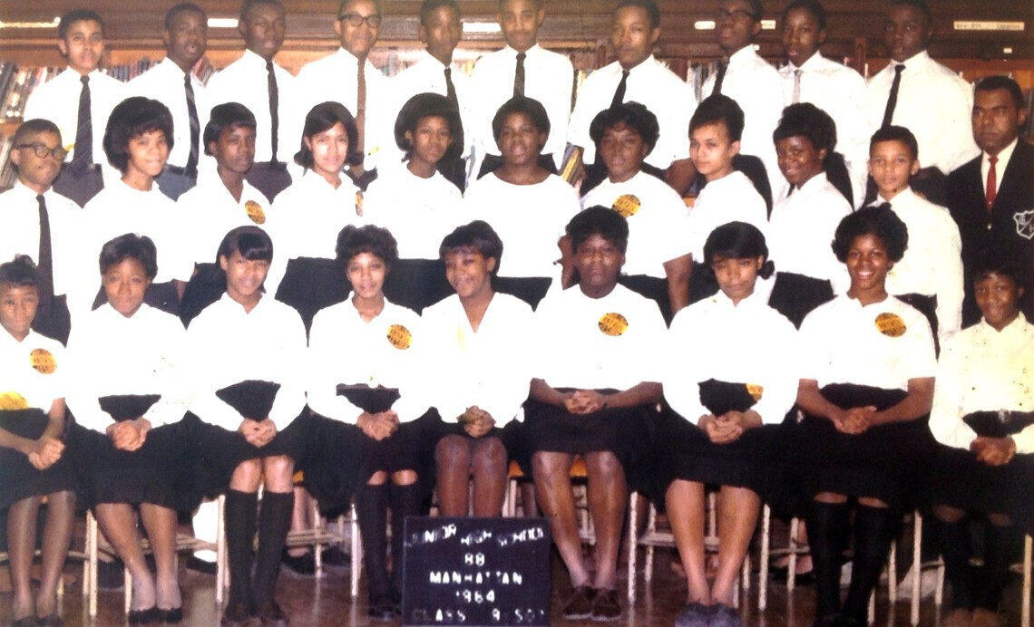 Mr. Edouard Plummer's 9th grade class, where Deborah Lucas-Davis is middle row, fourth from left.